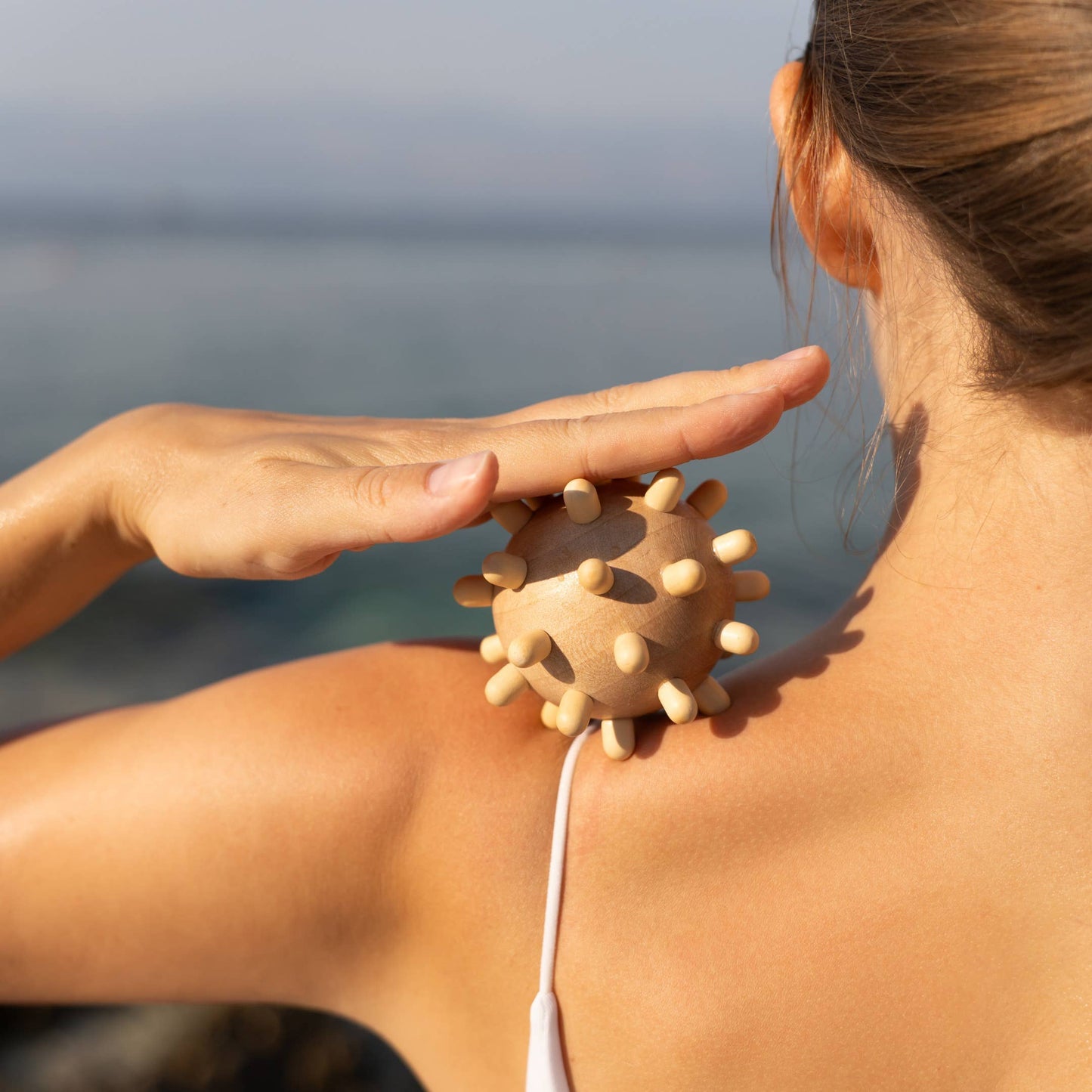 Massageball aus Lotusholz – Natürliche Entspannung für Hand & Körper